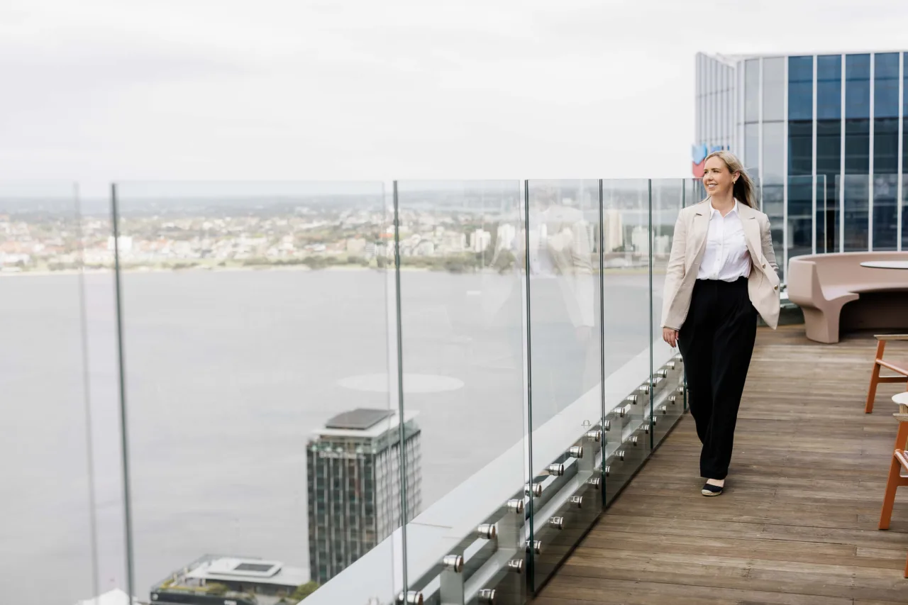 Jennifer Wragg, founder of Fledge People, on a city rooftop terrace